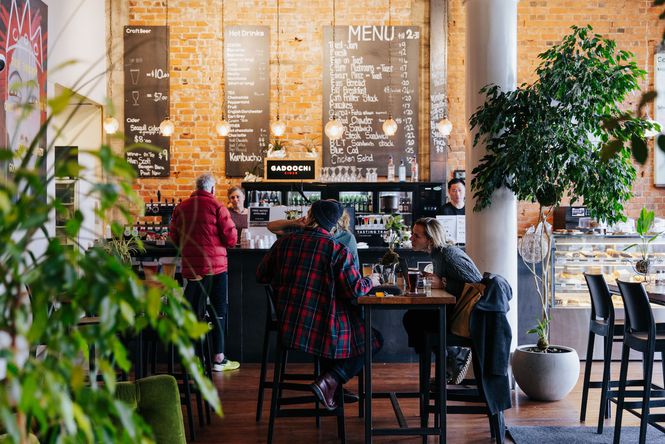 People dining inside Tuatara Café and Bar in Invercargill.