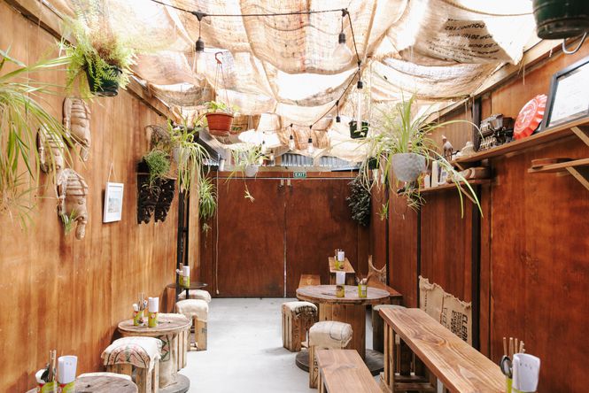 Inside a beautiful, rustic and sunny Satya Chai Lounge in Auckland.