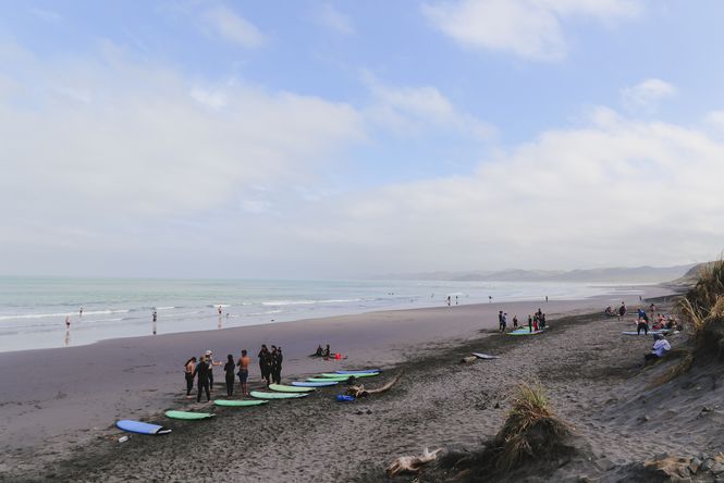 Raglan Surf School on the beach at Ngarunui, Raglan.