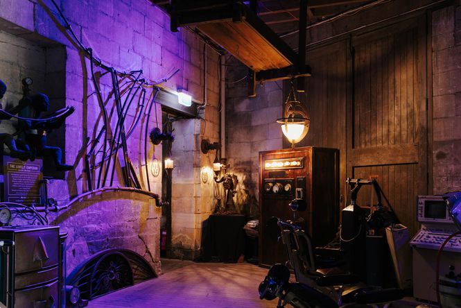 The purple-lit interior of the Steampunk building.