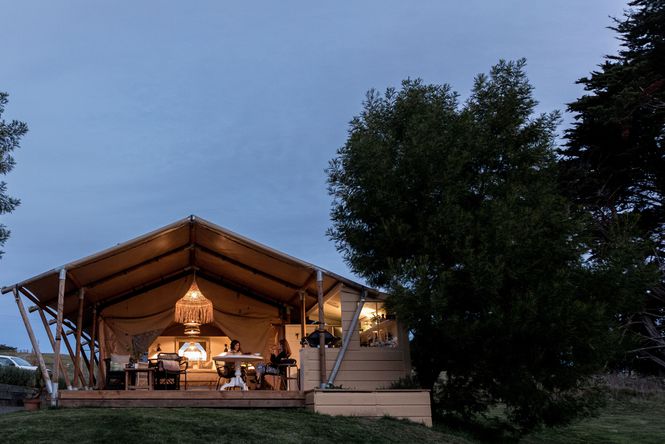 The exterior of a luxury tent at Clifton Camping.