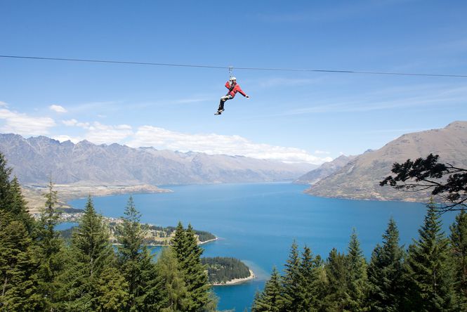Someone on the EcoZip above a lake.